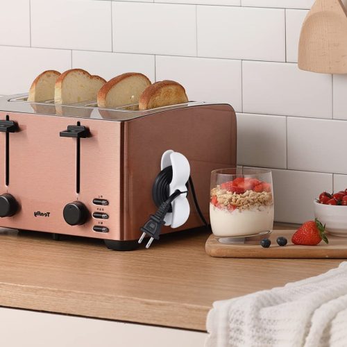 Selvklæbende Kabelholder på toaster